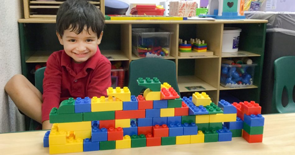 child playing lego