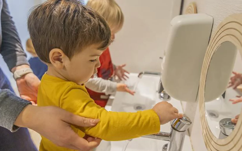 Child washing hands